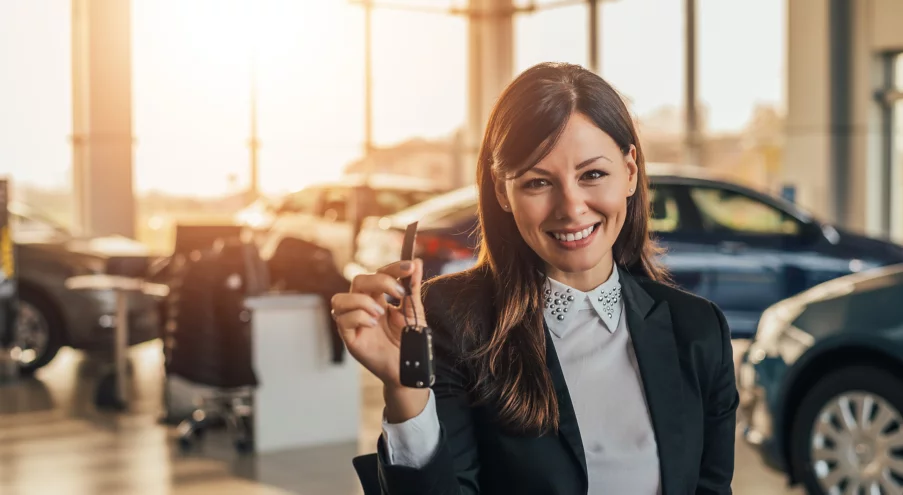 Woman holding car key