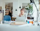 young woman with a computer