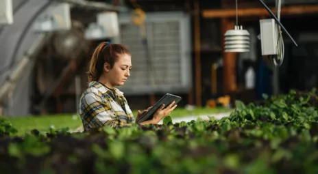 Woman in a greenhouse